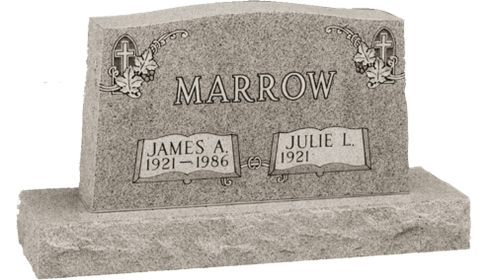 An upright custom headstone with a foundation.